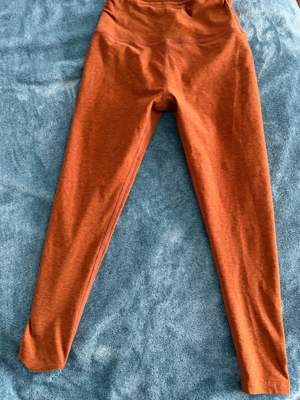 Womens size large beyond yoga rust colored leggings
